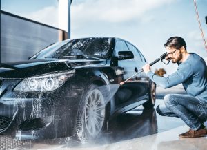 pressure wash to clean car